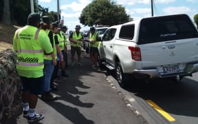 Biosecurity officers receiving a briefing before going door to door in the Devonport area.