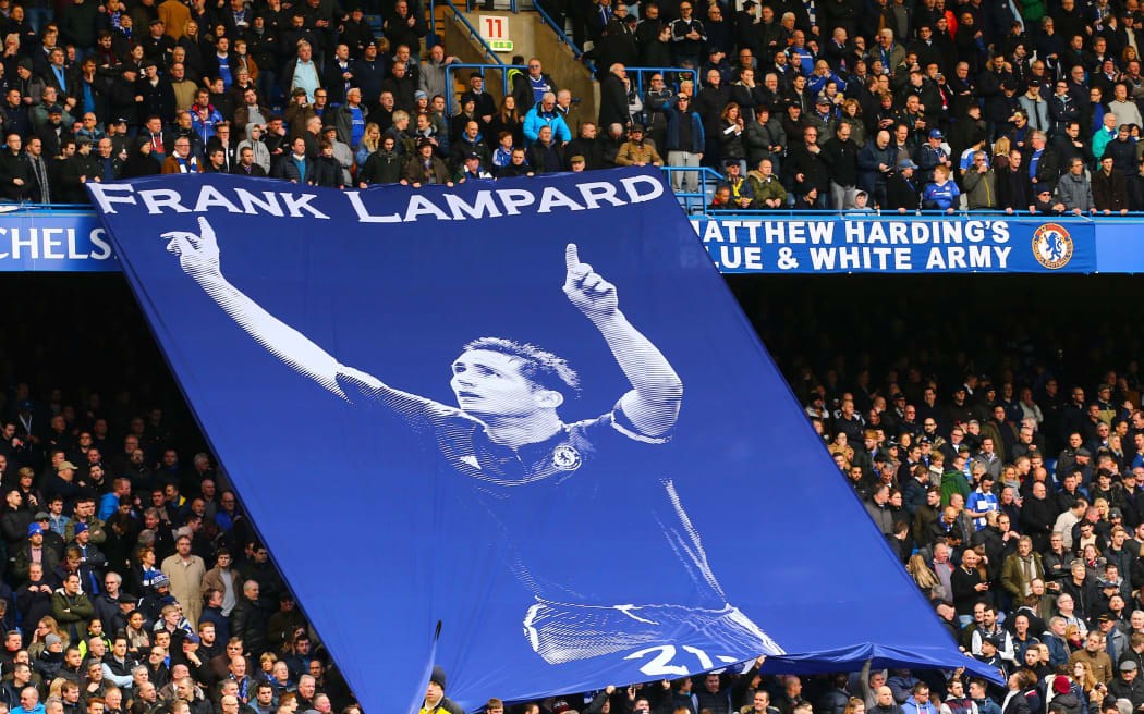 Ex Chelsea player and recently retired Frank Lampard is remembered in the Stamford Bridge stands with a giant flag.