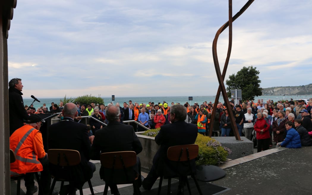 Crowd gathers for first train since quake Friday 15 Sept.