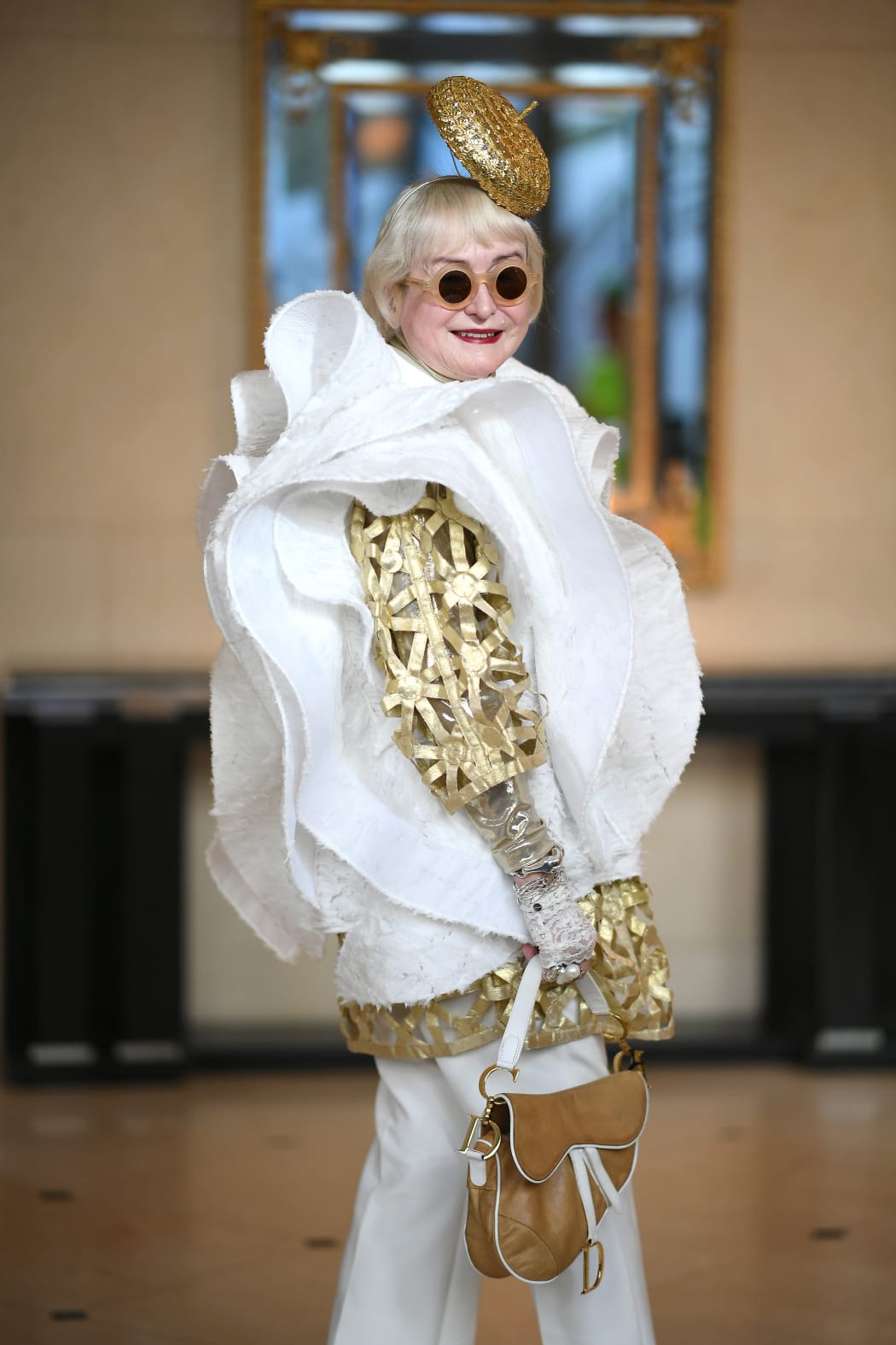 Debra J Quinn poses for a photo during 2024 Melbourne Cup Day at Flemington Racecourse on November 05, 2024 in Melbourne, Australia.