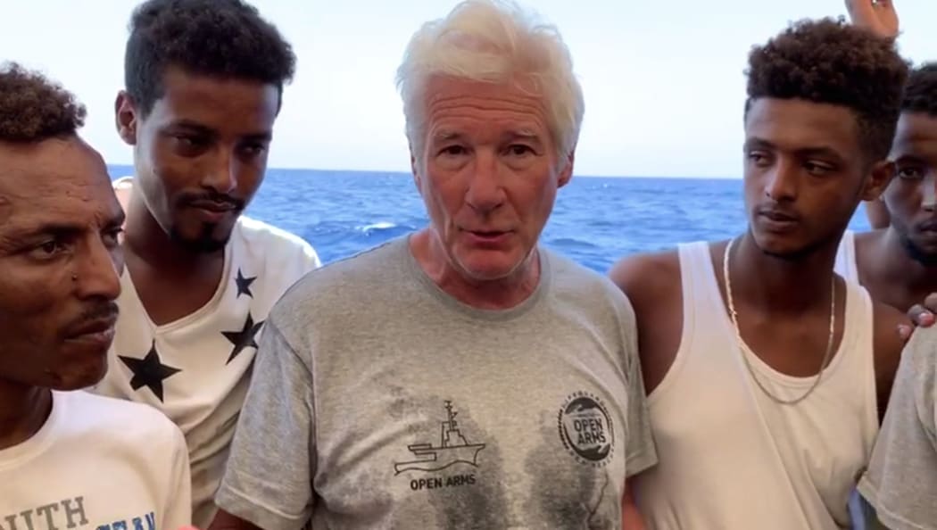 US actor Richard Gere on a Proactiva Open Arms boat transporting migrants rescued from the Mediterranean Sea.