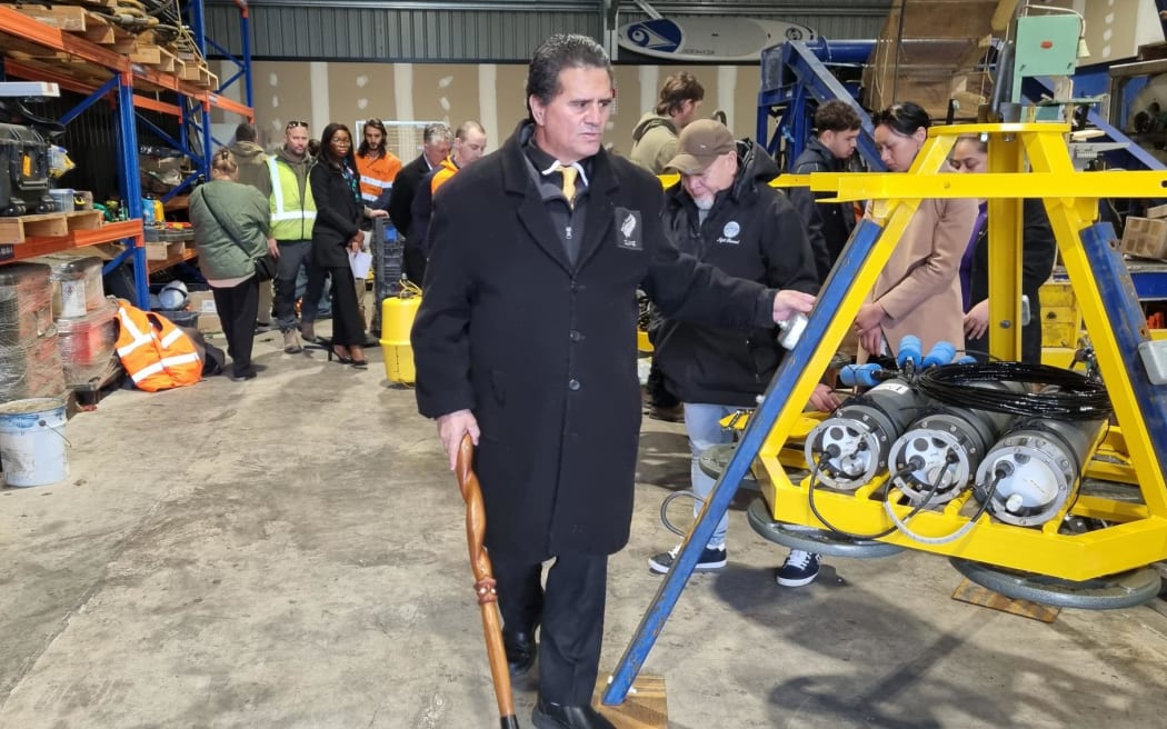 Ngāti Ruanui iwi member and South Taranaki District Councillor Clive Tongaawhikau blesses the Jasco marine mammal monitoring devices at New Plymouth Underwater's Moturoa headquarters.