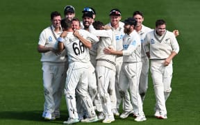 New Zealand players celebratee victory over England in the second test at the Basin Reserve, 2023.