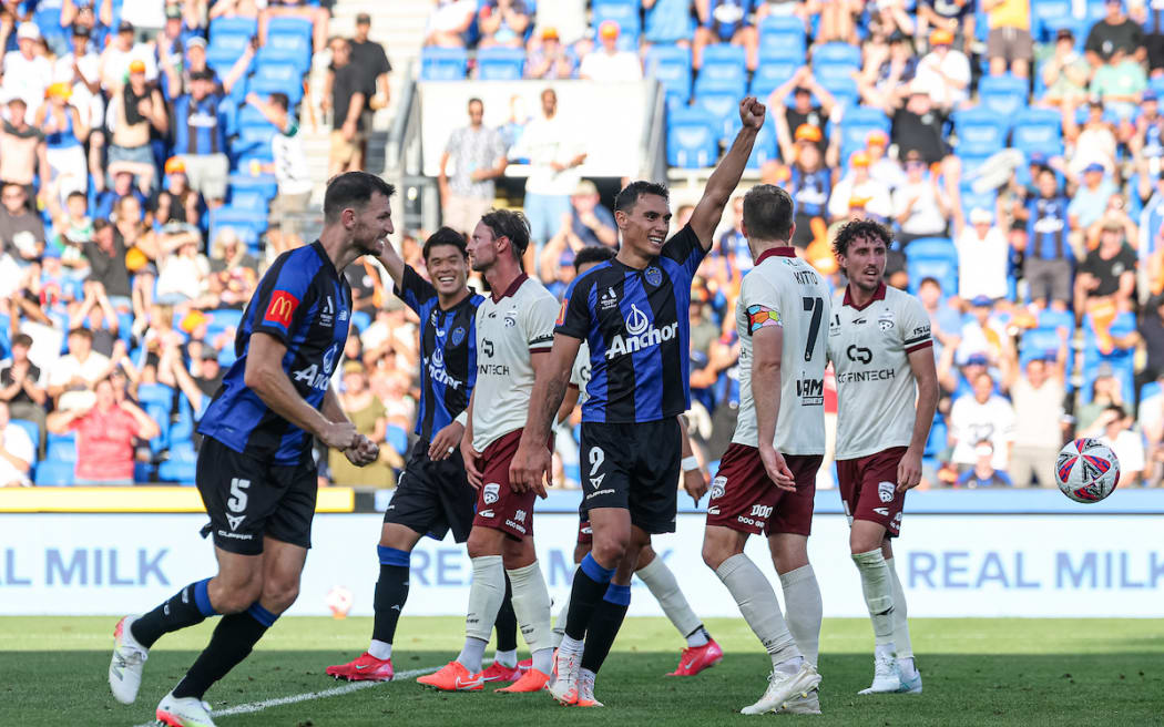 Auckland FC's Logan Rogerson celebrates his goal.