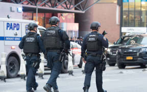 Police respond to the explosion at the Port Authority Bus Terminal in Manhattan.