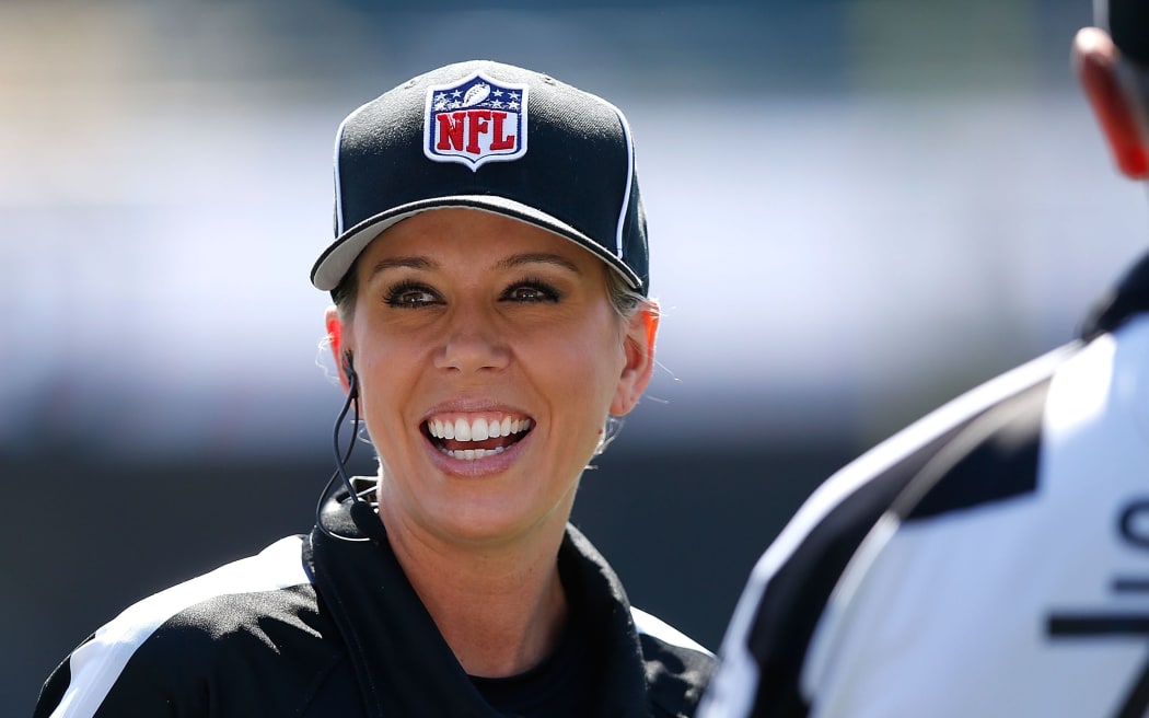 OAKLAND, CA - SEPTEMBER 20: Line Judge Sarah Thomas watches pregame activites between the Baltimore Ravens and Oakland Raiders at Oakland-Alameda County Coliseum on September 20, 2015 in Oakland, California.