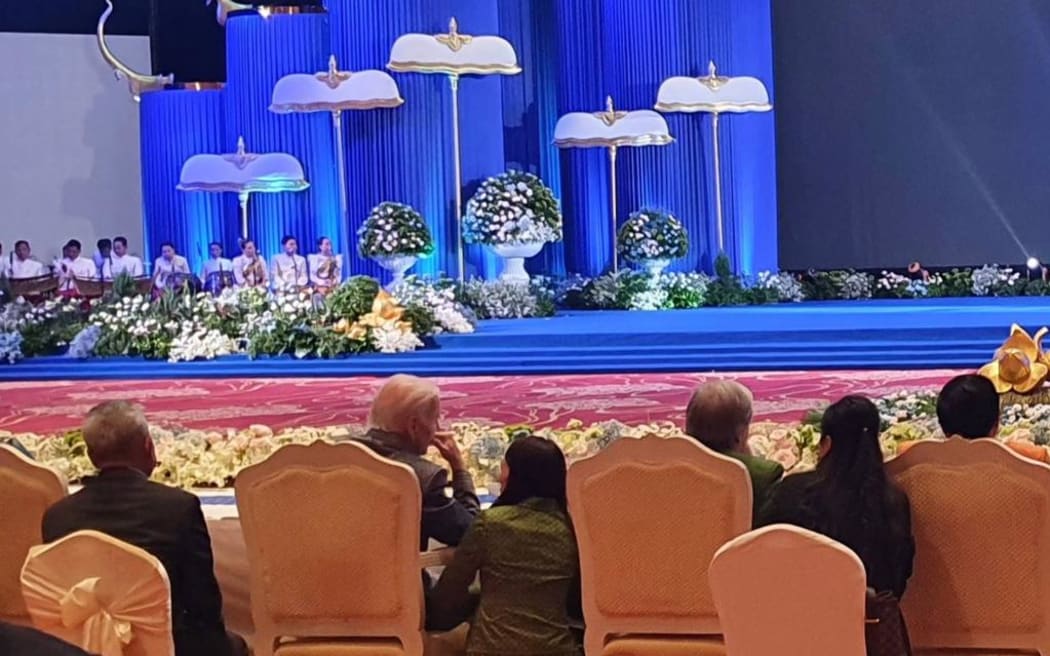 US President Joe Biden speaks with New Zealand Prime Minister Jacinda Ardern during the leaders' dinner at the East Asia Summit in Phnom Penh, Cambodia.