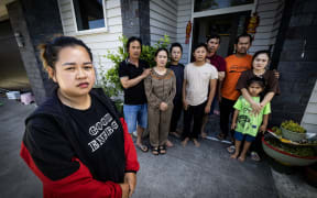 Sky Duong (front) with some members of the group of Vietnamese migrants that paid thousands for work visas but arrived in New Zealand to non-existent jobs.