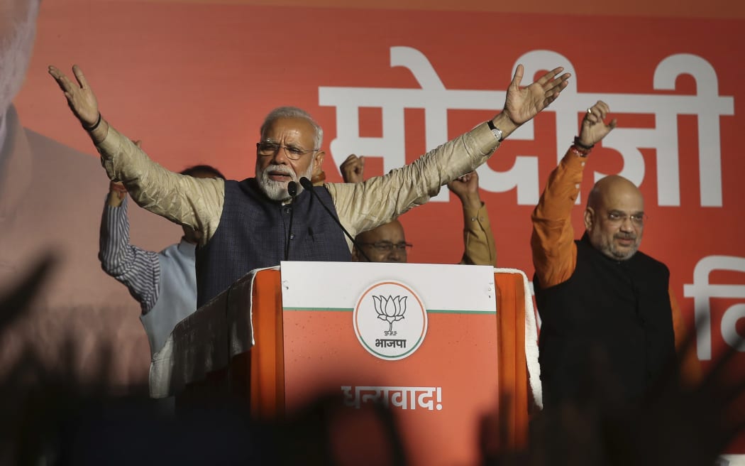 Indian Prime Minister Narendra Modi addresses party supporters.