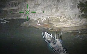 Auckland teens were rescued after becoming stranded on rocks at Auckland's Narrow Neck Beach, with the eagle helicopter helping locate them
