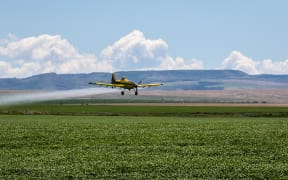 Top dressing plane, crop dusting.