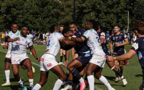 Fijian Drua players defend against the Rebels in Melbourne on Friday. Photo: Fijian Drua