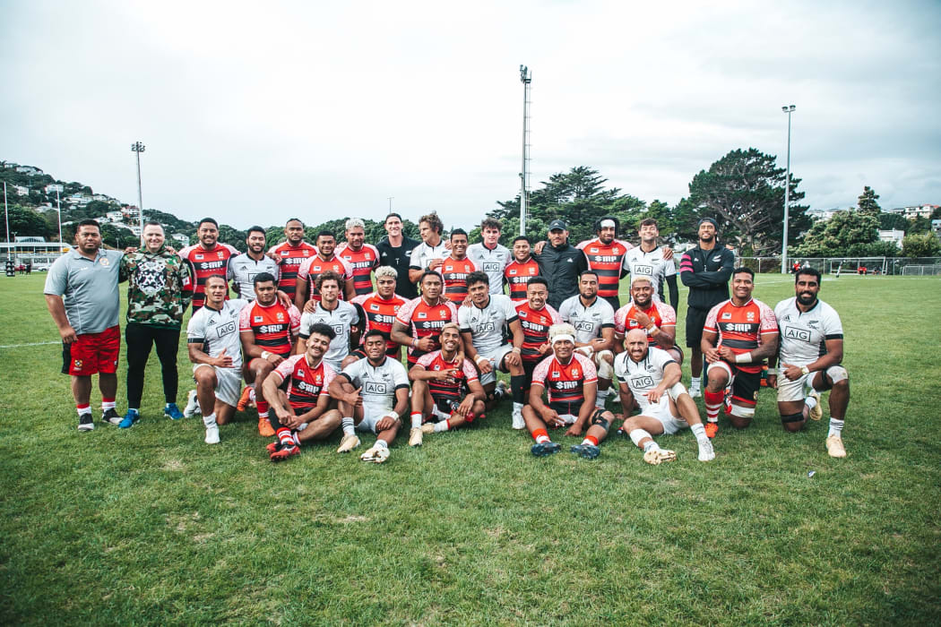 The All Blacks 7s and Tonga are all smiles after the Takiwhitu Tūturu final in Wellington.