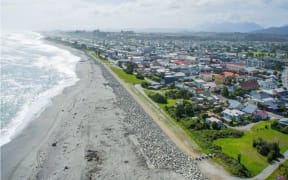 A drone view of the existing Hokitika seawall, with the proposed extension to stretch northward of the Hokitika town centre, middle.