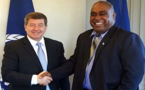 Minister Semi Koroilavesau, (right), meets ILO Director-General Guy Ryder.