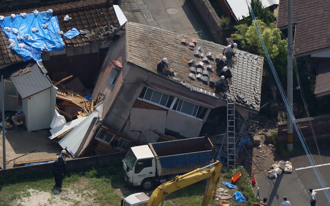 An aerial photo shows a house collapsed by the earthquake in Osaki City, Miyazaki Prefecture on August 9, 2024. At 4:43 p.m. on Aug. 8th, the earthquake measuring magnitude 7.1 occurred off the coast of Miyazaki Prefecture.  ( The Yomiuri Shimbun ) (Photo by Kota Kiriyama / Yomiuri / The Yomiuri Shimbun via AFP)