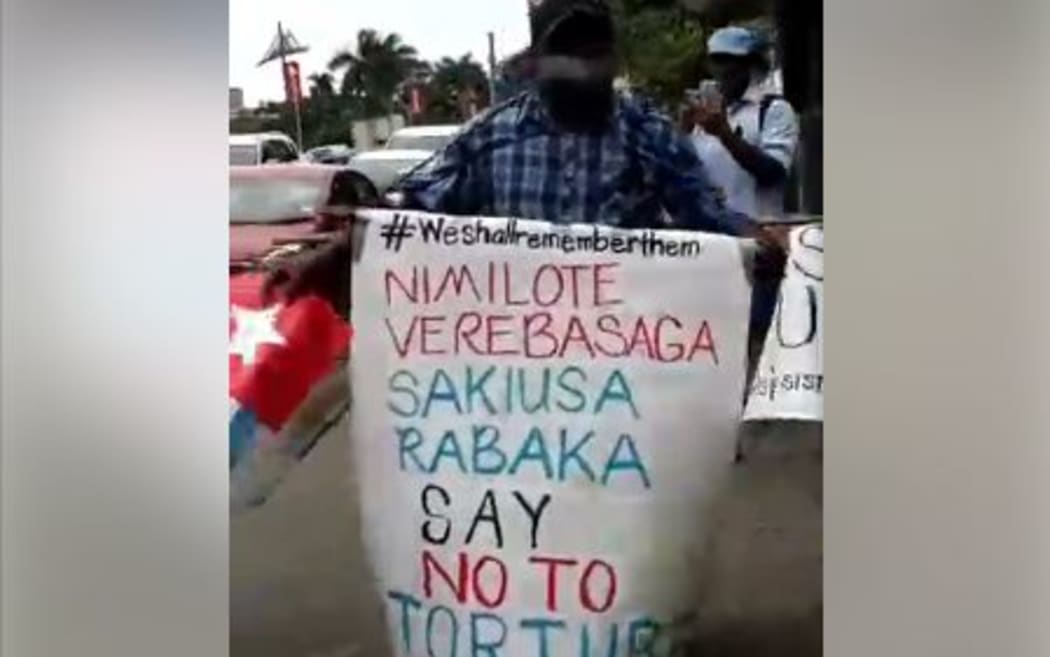 Jope Koroisavu makes a lone anti-torture protest on the pavements of Suva, marking UN Day in Support of Victims of Torture on 26 June 2017