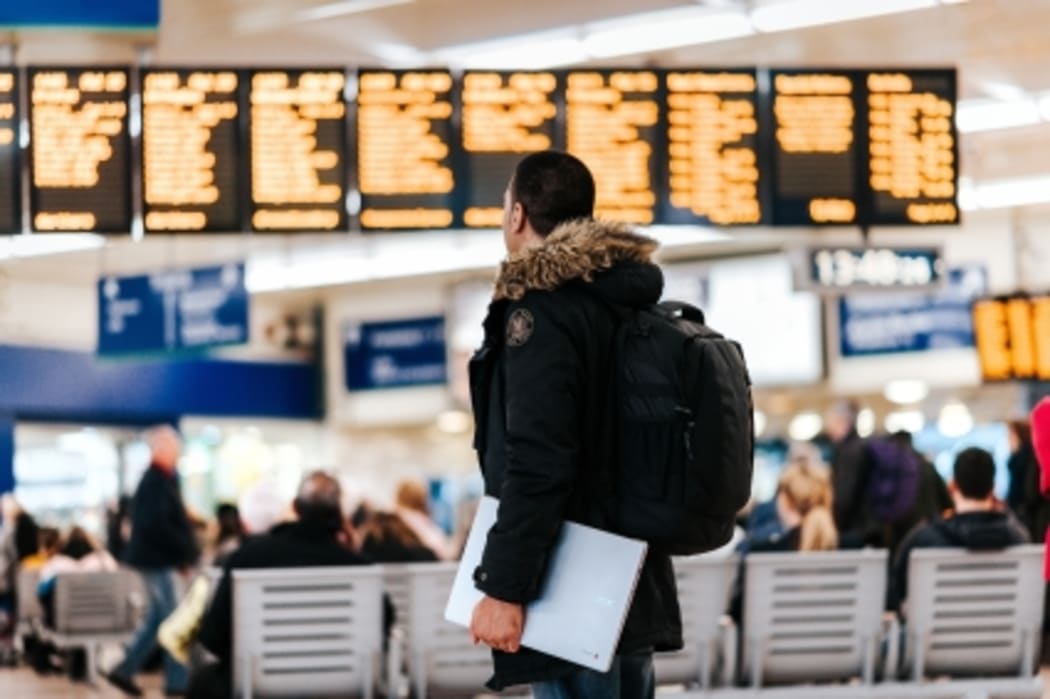 Airport traveller 2 (Photo by Anete Lusina on Unsplash)
