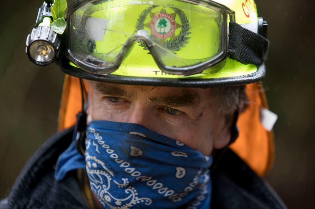 Firefighter Port Hills blaze. Photo posted 18 February 2017.