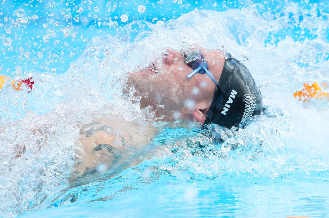 Corey Main of New Zealand competes in the Men's 100m Backstroke heats. 5 April 2018.