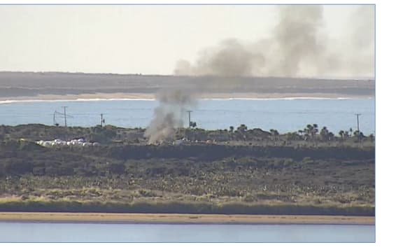 A small fire burns at the landfill in September 2018