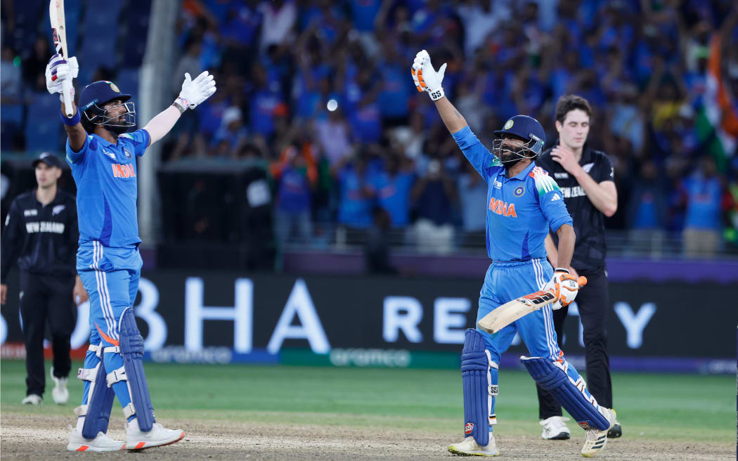 KL Rahul and Ravindra Jadeja of India celebrate their team's win over New Zealand in the Champions Trophy final, 2025.