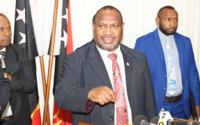 Papua New Guinea Prime Minister James Marape (centre) June 2020.