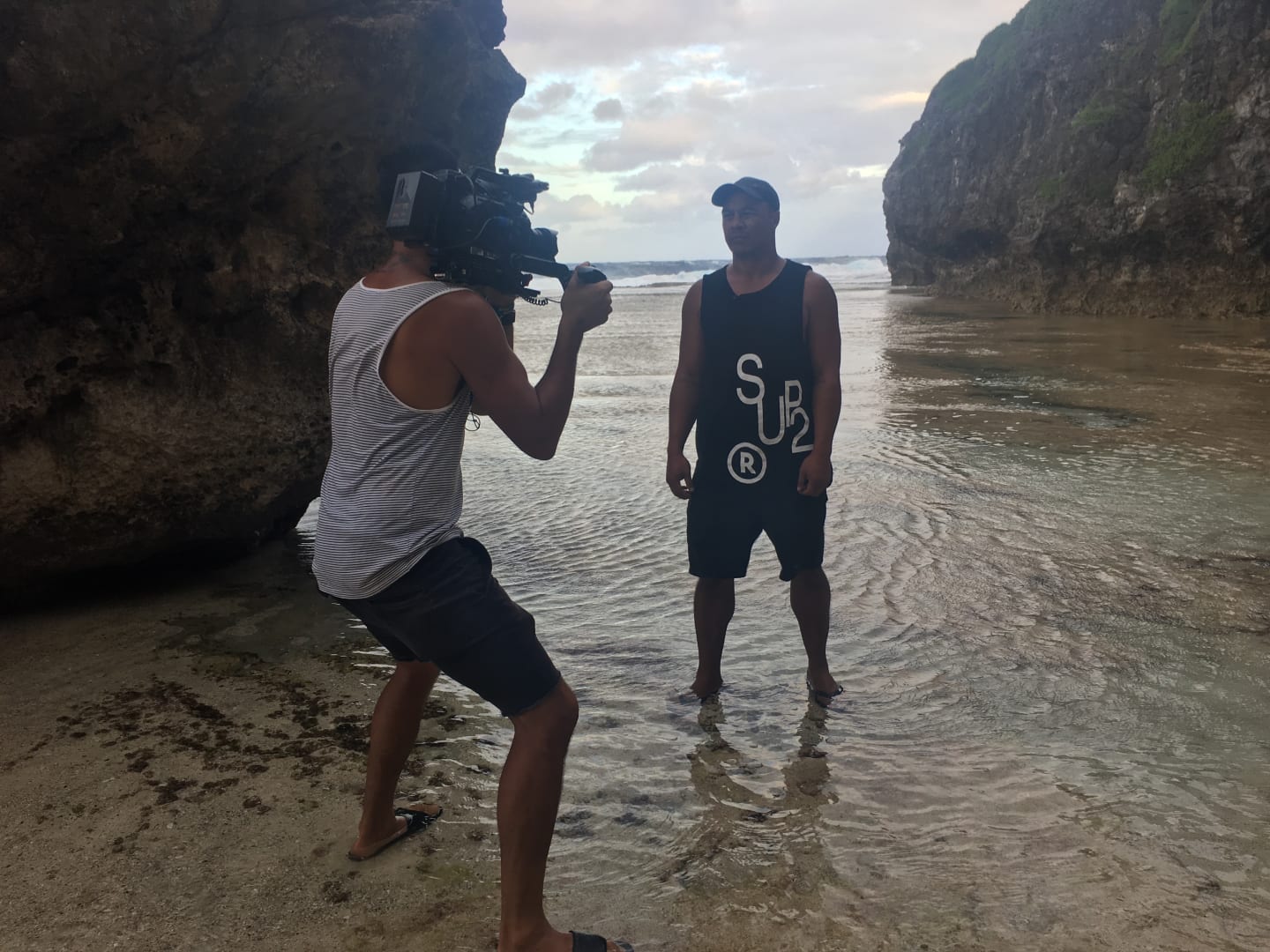 DOP, Jack Tarrant, filming presenter, Shimpal Lelisi in the waters of Niue