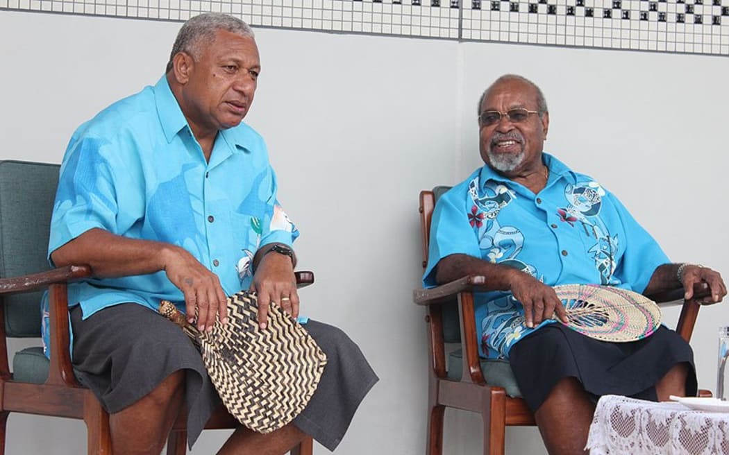 Frank Bainimarama and Sir Michael Somare at the Melanesian Spearhead Group (MSG) meeting in Suva in 2013.