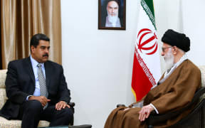A handout picture provided by the office of Iran's supreme leader Ayatollah Ali Khamenei released on October 22, 2016, shows him (R) meeting with Venezuelan President Nicolas Maduro in Tehran.