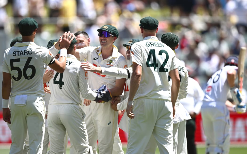 Australia celebrate an England wicket during the third Ashes test in Adelaide.