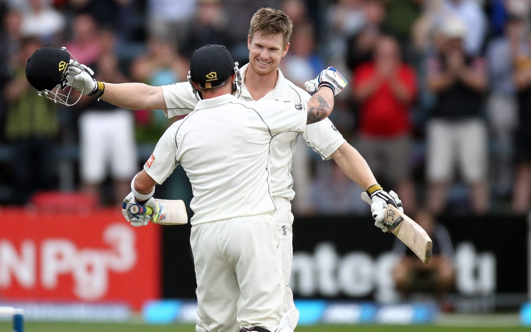 Jimmy Neesham hugs Blackcaps Captain, Brendon McCullum after scoring his maiden test century during the 2nd cricket test between the Black Caps & India in Wellington in February.