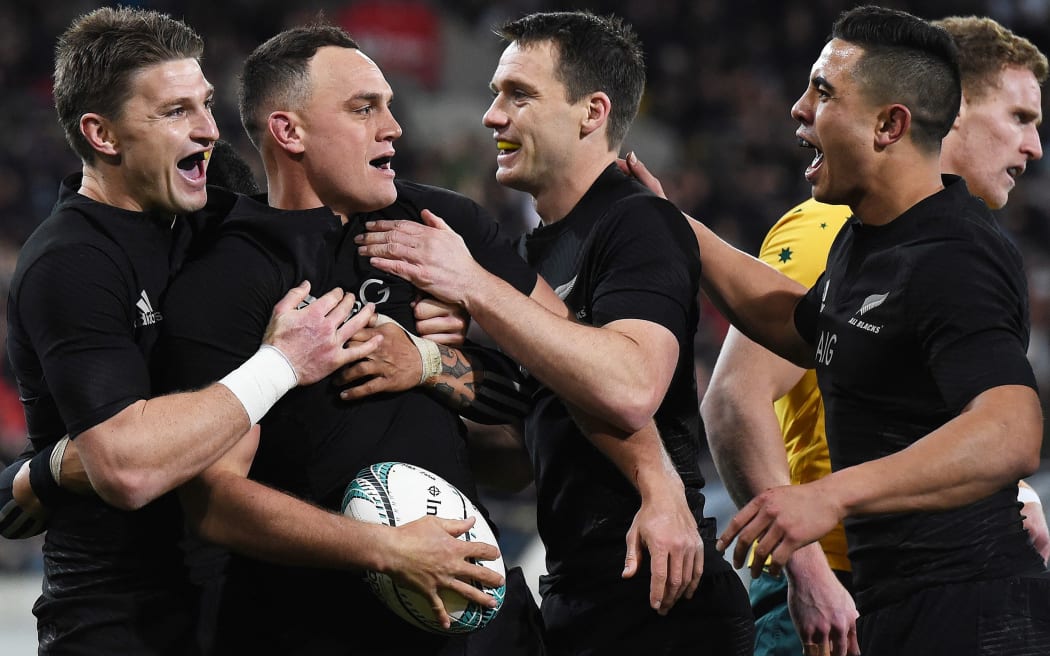 The All Blacks celebrate an Israel Dagg try.