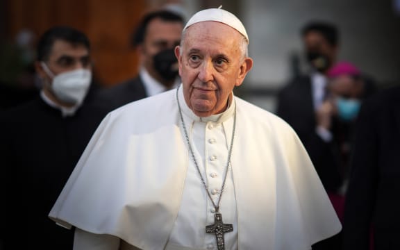 Pope Francis leaves the Syriac Catholic Cathedral of Our Lady of Salvation (Sayidat al-Najat) in Baghdad at the start of the first ever papal visit to Iraq on March 5, 2021.