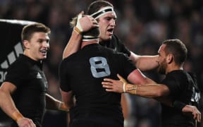 The All Blacks celebrate Kieran Read's try.
