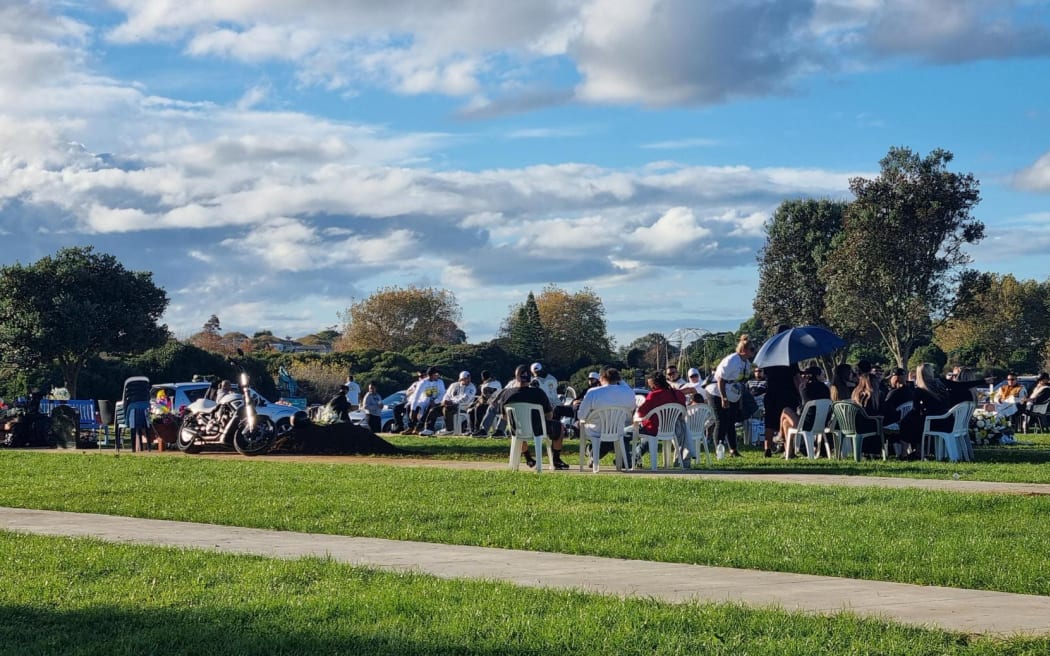 Mourners at Manukau Memorial Gardens for the burial of Hone Kay-Selwyn on 13 May 2024.