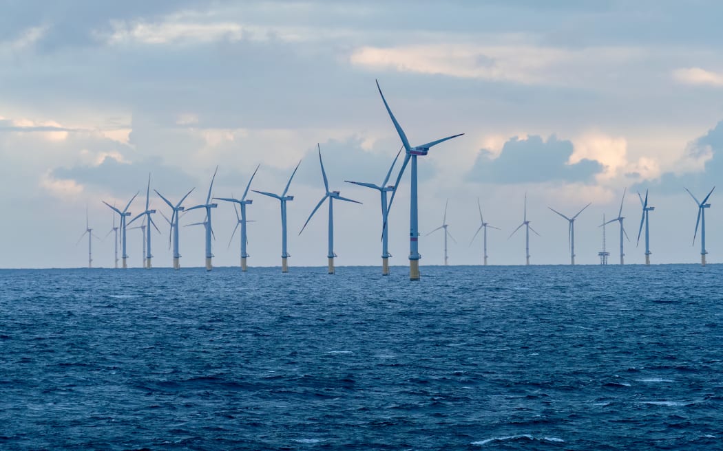 An offshore windmill farm in the Netherlands, producing renewable electric energy. (File photo).