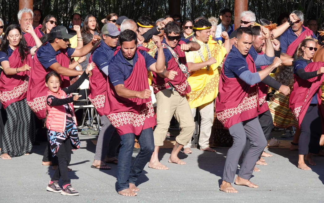 Sailors and supporters perform a haka at Te Tii Marae.