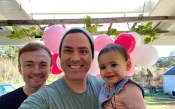 Tim Knowlman with his husband Poroutu and daughter Te Awa.