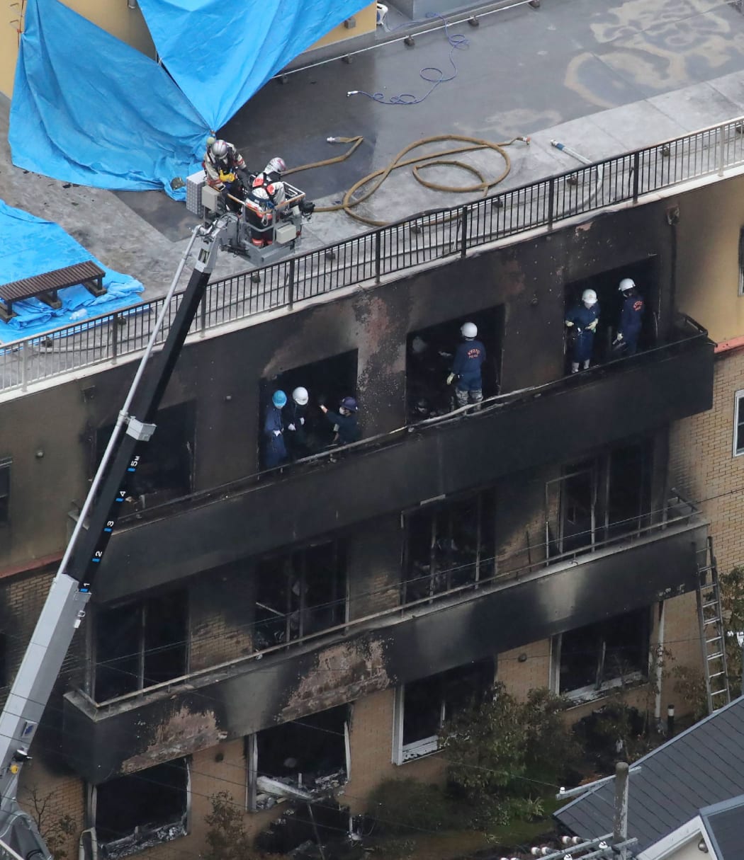 This aerial view shows the rescue and recover scene after a fire at an animation company building killed some two dozen people in Kyoto on July 18, 2019.