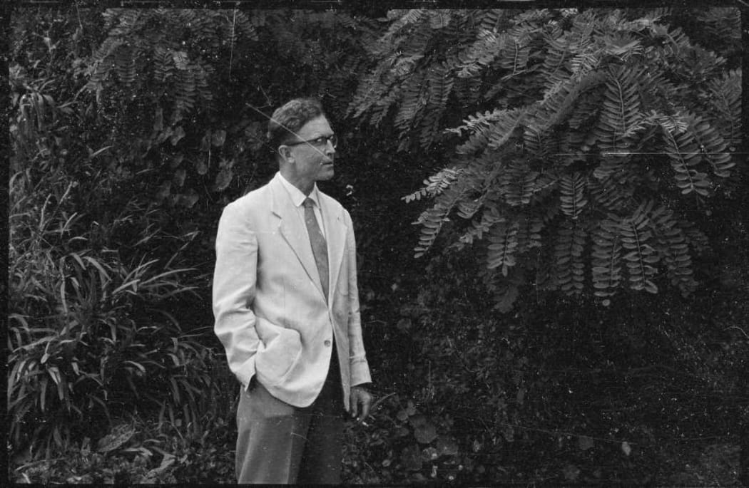 Portrait of Douglas Lilburn taken in the garden of his house at 22 Ascot Terrace, Thorndon, Wellington, 1960s.