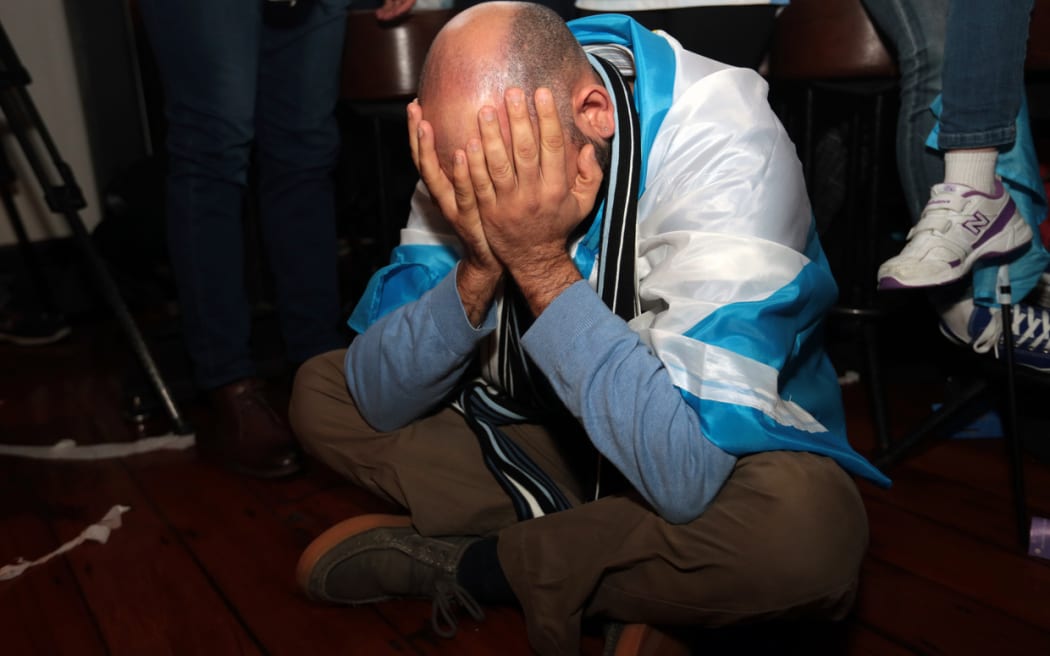 Despairing Argentina supporters watched the match slip away.