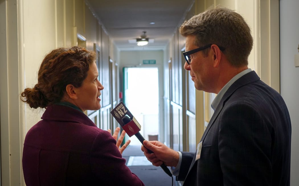 Refugee Resettlement Co-ordinator Sarah Ward with John Campbell.