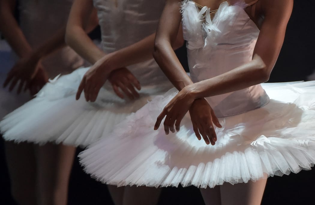 Dancers of the Aalto Ballett Essen perform "Swan Lakein Seville, on January, 2022. (Photo by CRISTINA QUICLER / AFP)