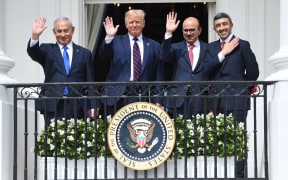 Israeli Prime Minister Benjamin Netanyahu, US President Donald Trump, Bahrain Foreign Minister Abdullatif al-Zayani, and UAE Foreign Minister Abdullah bin Zayed Al-Nahyan wave from the Balcony at the White House in Washington on 15 September, 2020.