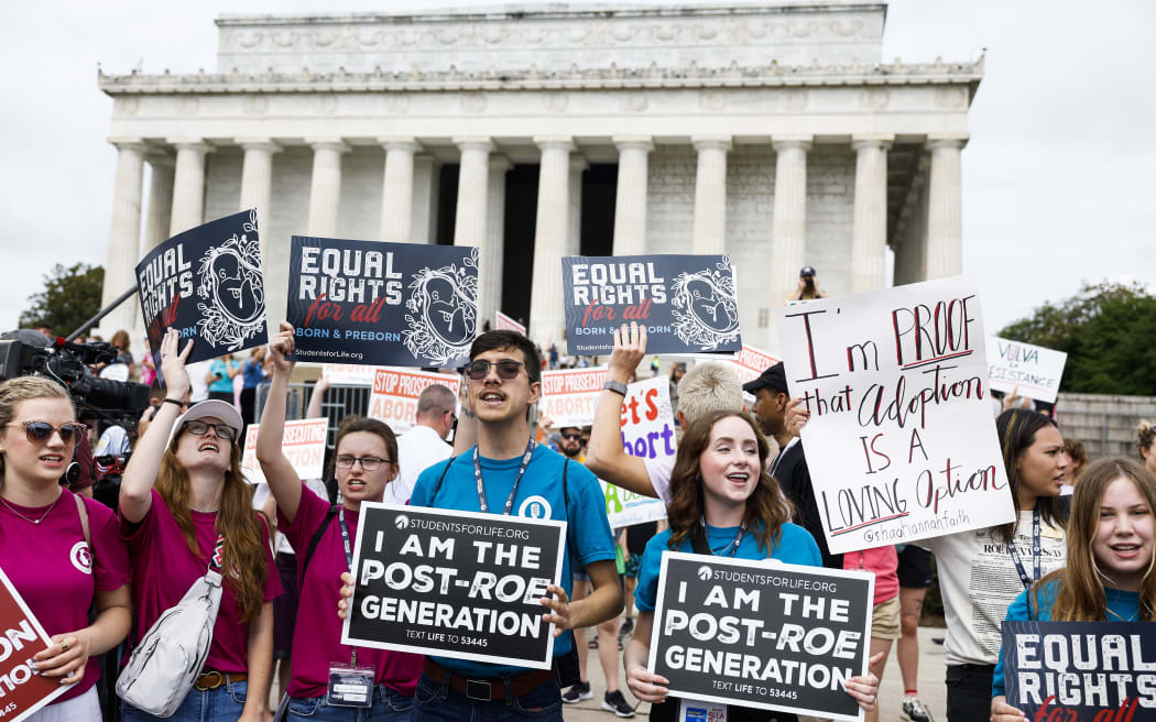 Anti-abortion activists chant during a Celebrate Life Day Rally at the Lincoln Memorial on 24 June, 2023 in Washington, DC.