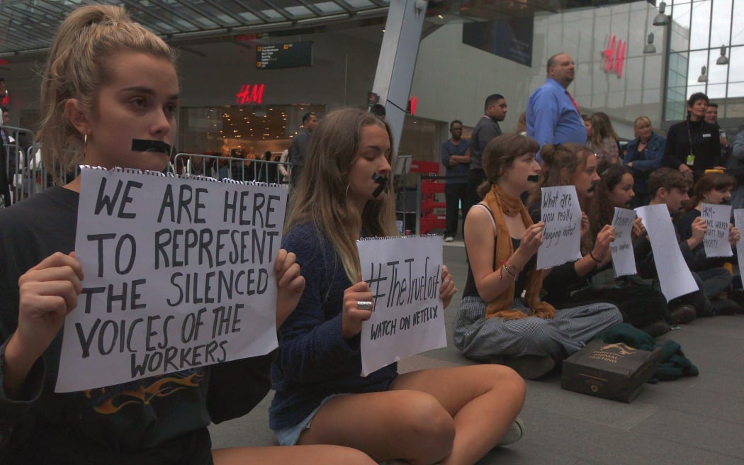 Protestors outside H&M as the Swedish firm opens its first NZ store.