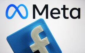Facebook logo and new company brand Meta Platforms Inc. logo are pictured in this illustrative photo taken in Kyiv on 29 October, 2021.