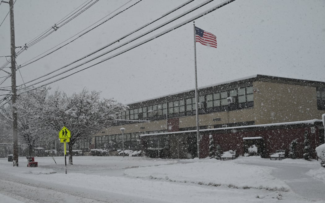 Fair Lawn High School is seen empty due to a snowstorm affecting the area in Fair Lawn, New Jersey, United States, on February 13, 2024. The snowstorm is leading to the closure of Fair Lawn High School, with no school and no classes taking place because of the heavy snowfall. Travel on highways and local streets is being affected, with accidents reported throughout New Jersey and New York. Flight delays are also impacting the region. (Photo by Kyle Mazza/NurPhoto) (Photo by Kyle Mazza / NurPhoto / NurPhoto via AFP)