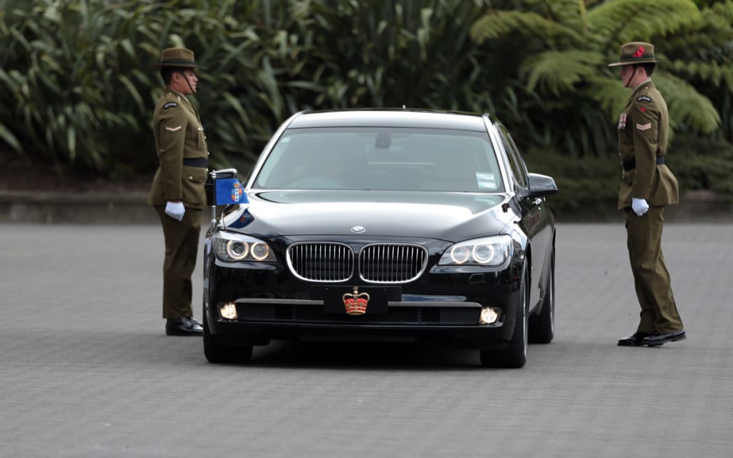 The Governor General car pulls up at Armistice Day celebrations.